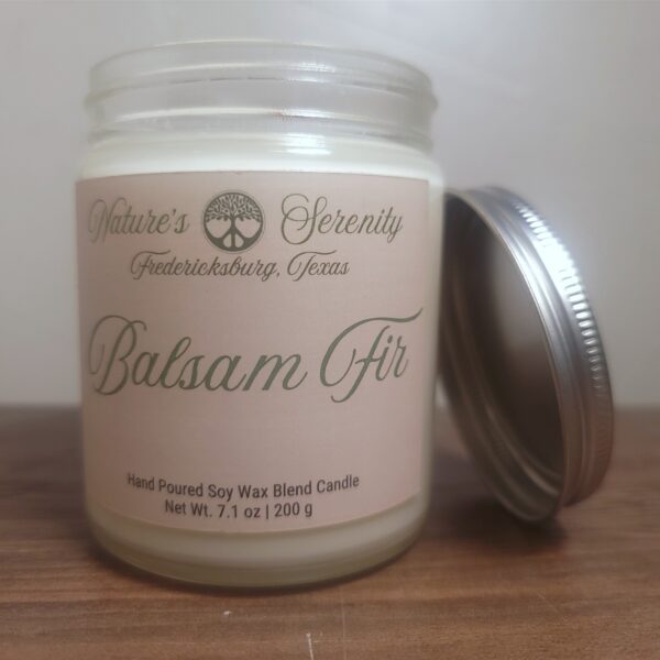 Open Balsam Fir soy wax blend candle with wooden wick and metal lid