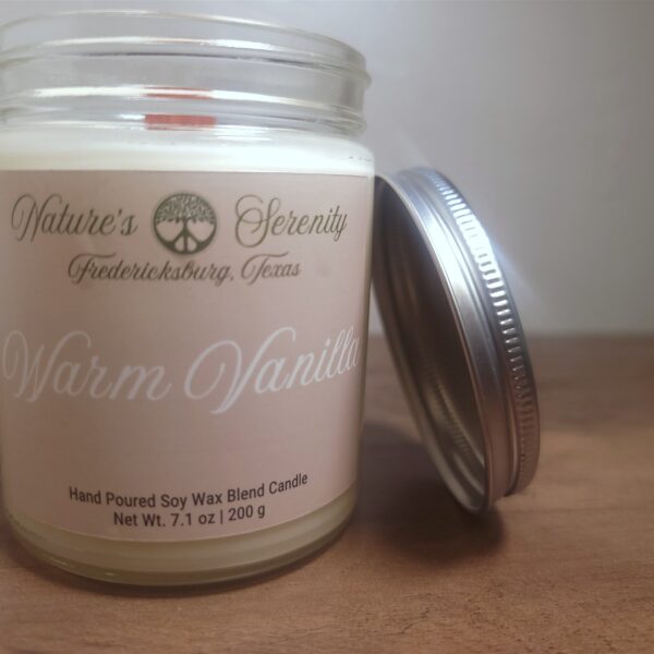 Open Warm Vanilla soy wax blend candle with wooden wick and metal lid
